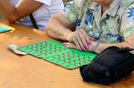 Playing BINGO at a local county fair fundraiserの写真素材