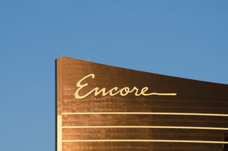 Las Vegas  November 11 2014: The sun reflects off the golden windows of the Encore part of the Wynn Hotel and Casino on the Las Vegas Stripのeditorial素材