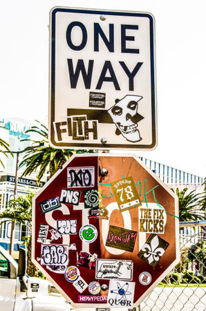 Stickers from local bands and movements damage a sign in Las Vegas Nevadaの写真素材