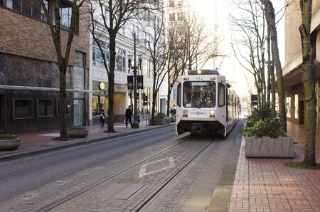 Portland, OR, USA - February 21, 2014: Mass transit train operates in downtown Portland, South Park Blocksのeditorial素材