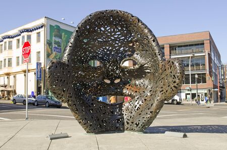 Portland, OR, USA - March 7, 2015: Facing the Crowd is a series of two outdoor sculptures by American artist Michael Stutz, located outside of Providence Parkのeditorial素材