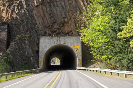 Tunnel 1 through a columnar basalt along Washington State Hwy 14 in the Columbia River Gorgeの写真素材