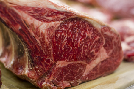 Close up of a piece of meat in the butcherの写真素材