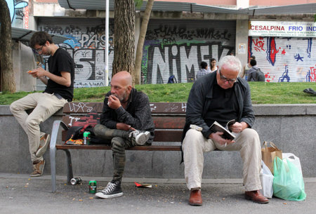Three men of different generations in the streetのeditorial素材