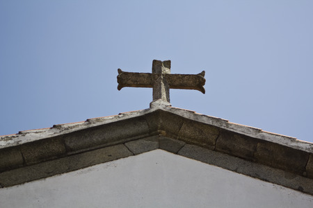 Cross in a blue sky backgroundの写真素材