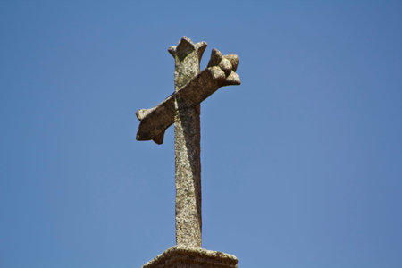 Cross in a blue sky backgroundの写真素材
