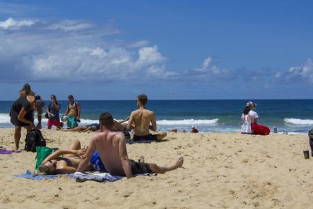 People sunbathe at Australian beachのeditorial素材