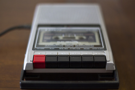 Vintage cassette tape recorder with audio tape cassette insideの写真素材