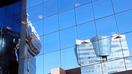 Reflection on a business glass building