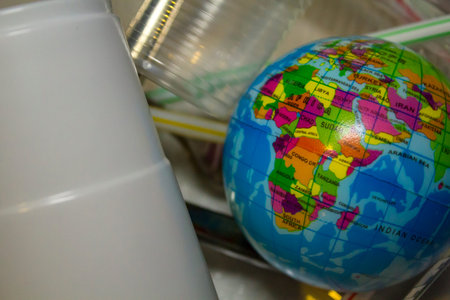 World surrounded by plastic trash. Plastic pollution concept