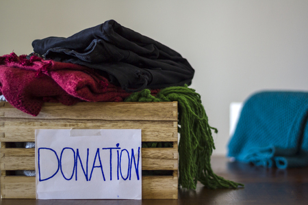 Clothes in box for concept donationの写真素材