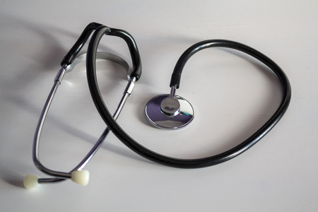 Stethoscope on white table. Healthcare conceptの写真素材