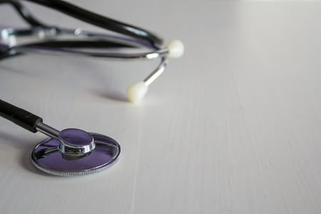 Stethoscope on white table with copy space. Medical conceptの写真素材