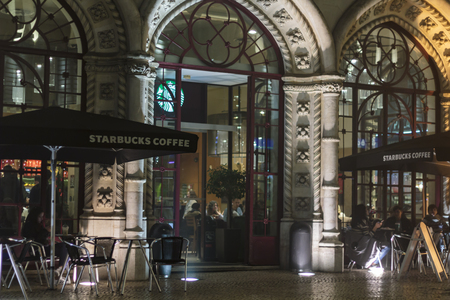 Lisbon, Portugal - Circa December 2018: Starbucks Coffee Exterior Facade at nightのeditorial素材