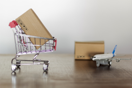 Trolley with carton. Shopping and International shipping conceptの写真素材