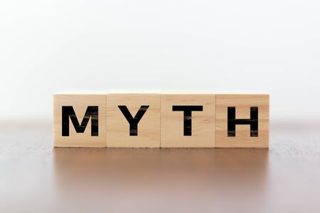 Myth word written on wooden cubes on white backgroundの写真素材