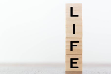 Life word on wooden cubes with copy spaceの写真素材