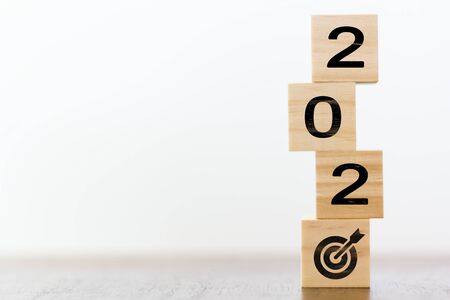 2020 on wooden cubes with goal target. New year´s sucess conceptの写真素材
