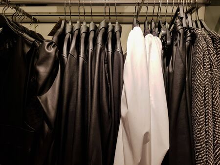Fashionable clothes in a boutique storeの写真素材
