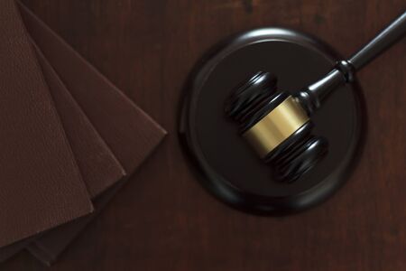 Top view of Judge's gavel and law book on wooden tabkeの写真素材