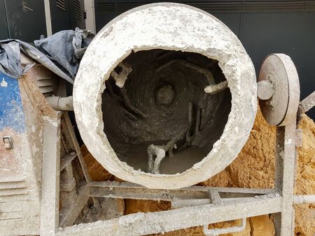 Concrete mixer with cement at a construction siteの写真素材