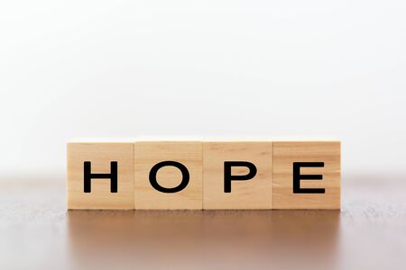 Wooden cubes with the word Hopeの写真素材