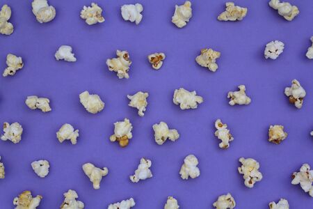 Set of popcorn on purple backgroundの写真素材