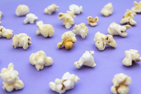 Popcorn on purple backgroundの写真素材
