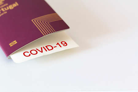 Passport and covid-19 note. Concept of Traveling during coronavirus, covid-19 pandemicの写真素材