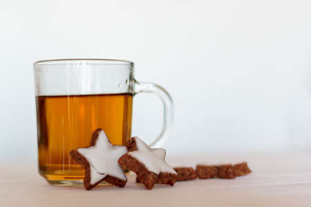 Tea and homemade cookies on white background. With copy spaceの写真素材