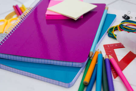 School supplies on white wooden tableの写真素材
