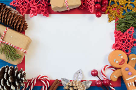 Top view of christmas decoration and blank card with copy spaceの写真素材