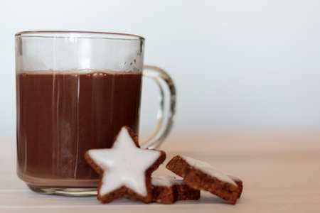Hot chocolate with cookies on white background with copy spaceの写真素材