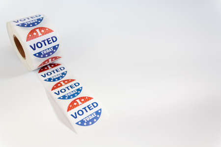 Roll of I Voted Today stickers on white background with copy space. US presidential election conceptの写真素材