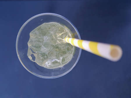 Top view of mojito drink with ice and strawの写真素材