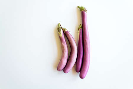 Top view of Japanese eggplant on white background with copy spaceの写真素材