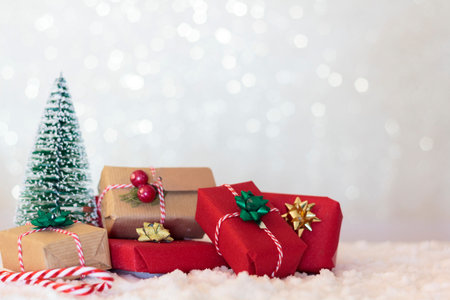 Christmas background with wrapped gifts and chistmas tree. With copy spaceの写真素材
