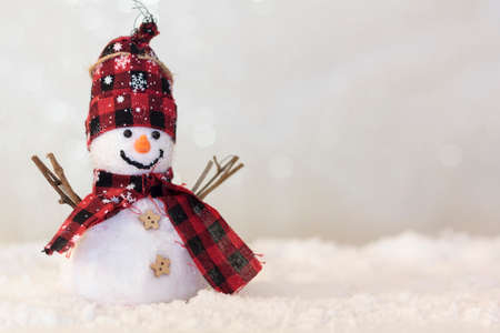Handmade wooden Christmas truck with christmas gifts on snowy roadの写真素材