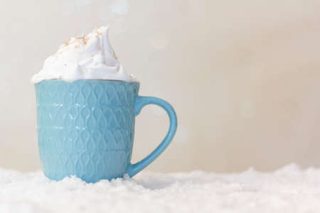 Handmade wooden Christmas truck with christmas gifts on snowy roadの写真素材