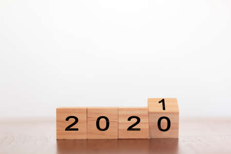 New year 2020 change to 2021. Wooden cubes with copy spaceの写真素材