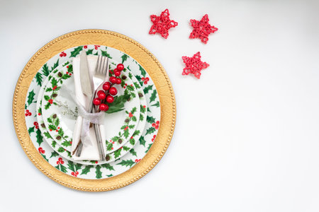 Christmas Table Setting on white background. Top view with copy space