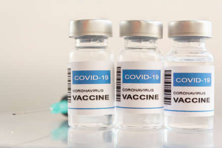 Syringe and Covid-19 coronavirus vaccineの写真素材