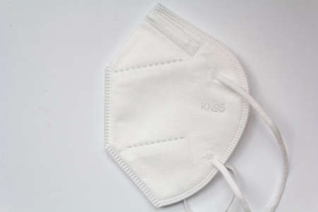 Top view of ffp2 Kn95 mask on white backgroundの写真素材