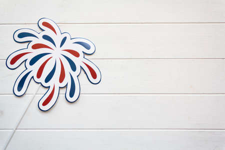 Fireworks on white wooden table with copy space. USA holiday, 4 of July, celebration conceptの写真素材