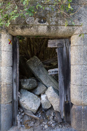 Door of destroyed houseの写真素材