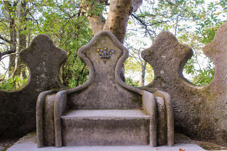Stone throne with crownの写真素材