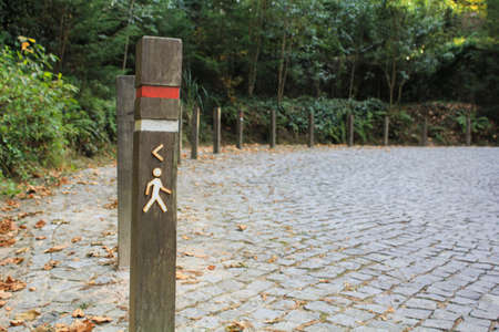 Trail marking sign painted on postの写真素材