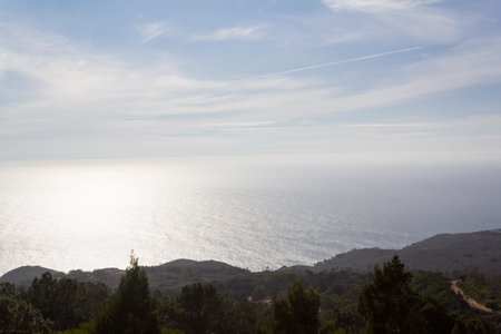 High angle view of sea and blue skyの写真素材