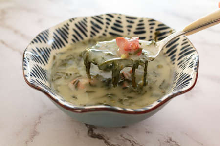 Caldo verde soup, a portuguese kale soup with chorizoの写真素材