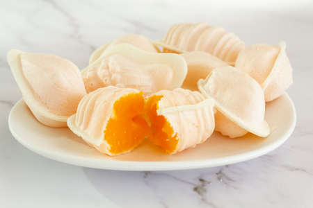 Typical portuguese egg yolk sweets called Ovos Moles de Aveiroの写真素材